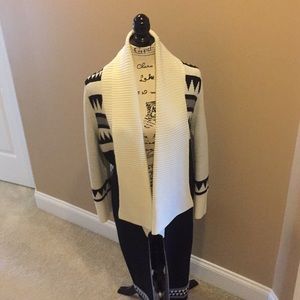 long, warm sweater made by Minkpink